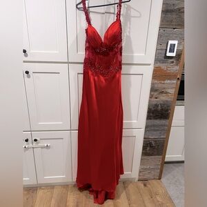 Jasz couture gem embellished red satin dress with mesh corset and train.